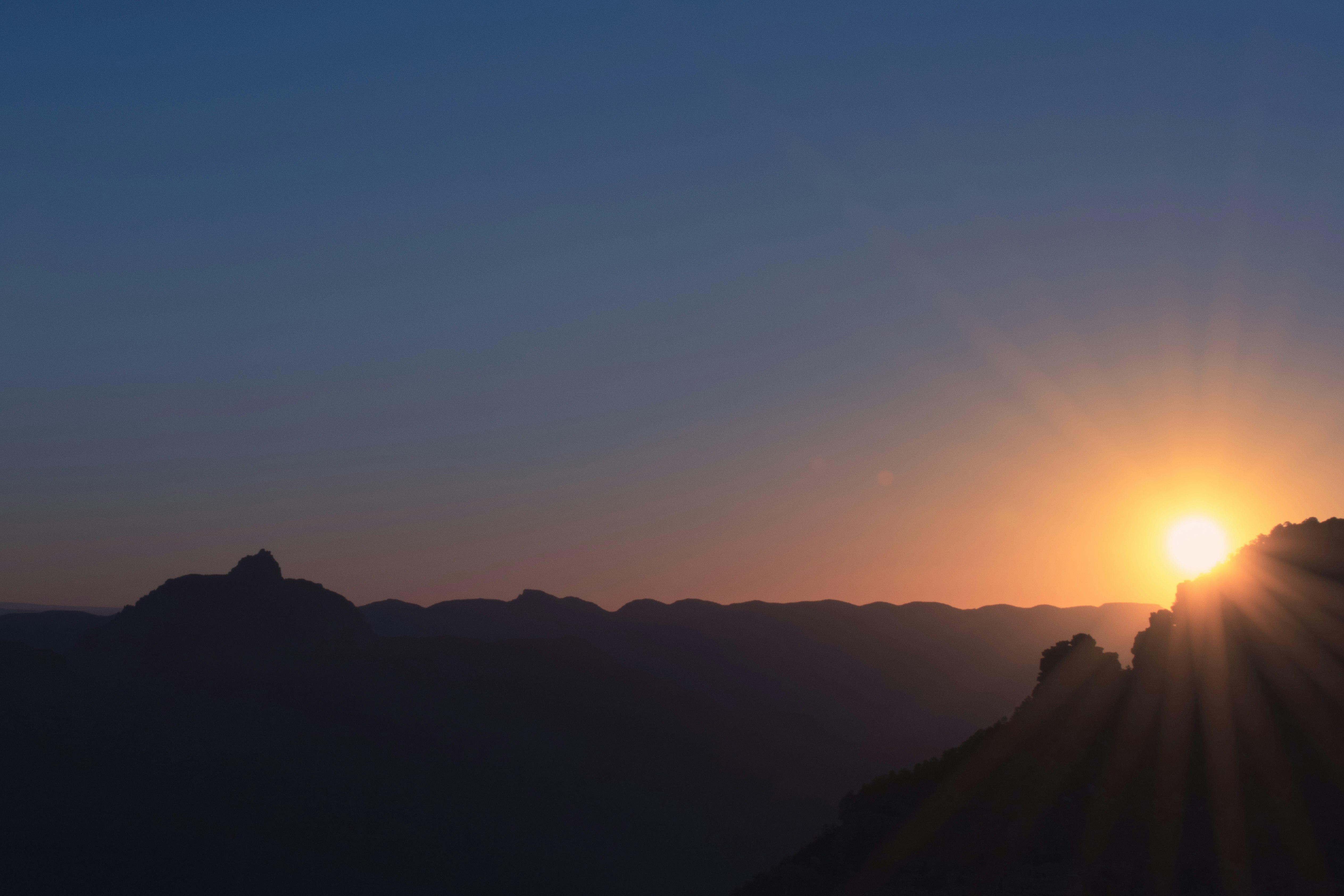 aerial photography of mountain during sunrise photo